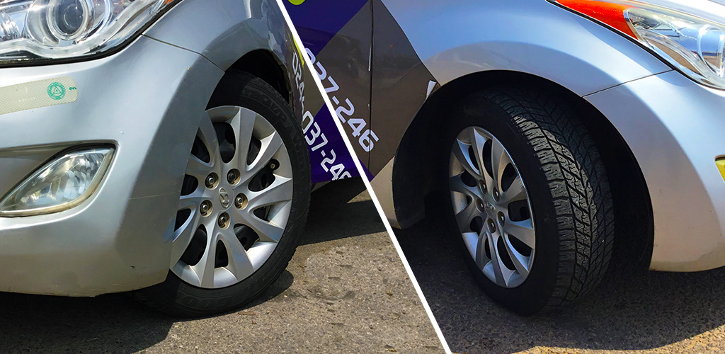 Turned tyres of Toptech Ghana branded vehicle